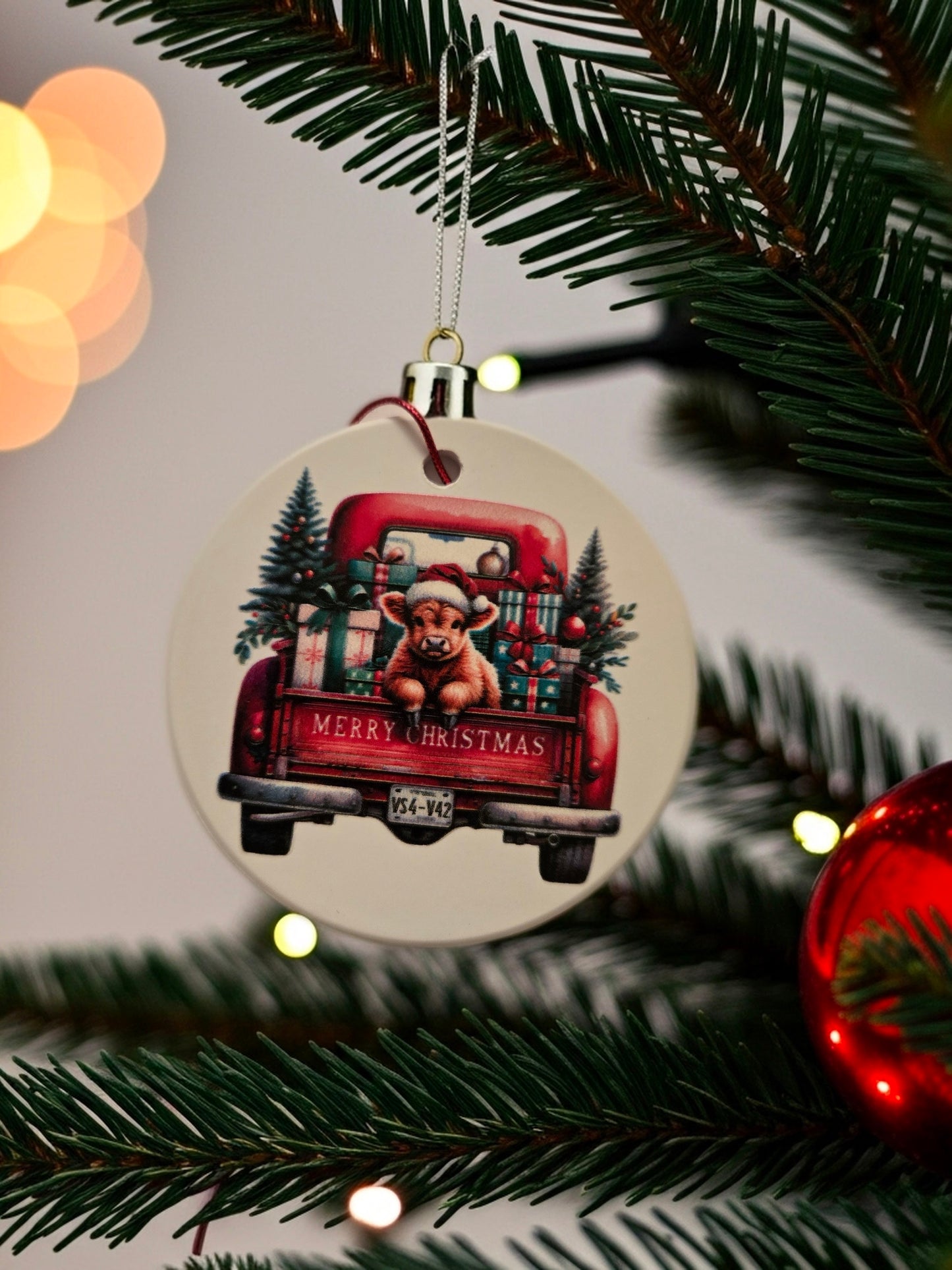 Highland Cow in a Red Truck